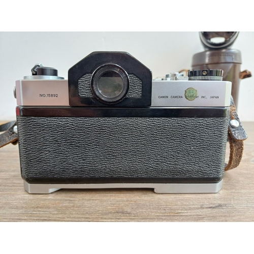 575 - A Canon Canonflex R2000 35mm SLR camera body with clip-on articulated selenium meter and two Super-C... 