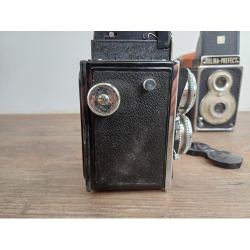 577 - Two cased Haking Halina 6x6 medium format cameras for 120 film, one A1 TLR and one Prefect pseudo TL... 