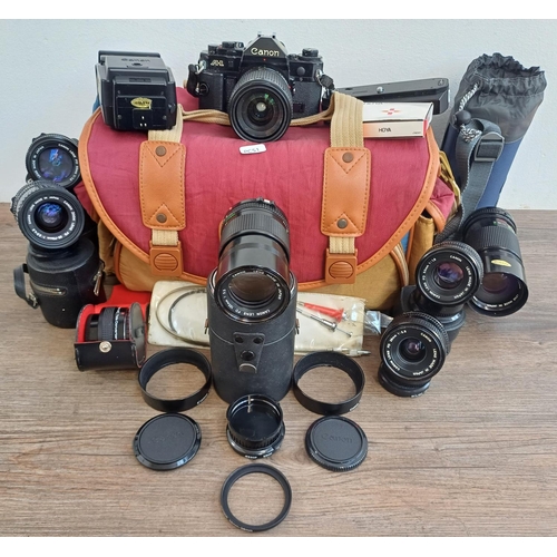 578 - A camera bag containing Canon A-1 35mm SLR camera fitted with Canon FD 35-105mm 1:3.5-4.5 lens, Cano... 