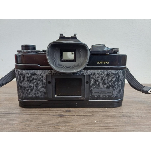 578 - A camera bag containing Canon A-1 35mm SLR camera fitted with Canon FD 35-105mm 1:3.5-4.5 lens, Cano... 