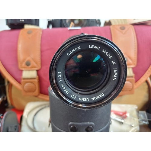 578 - A camera bag containing Canon A-1 35mm SLR camera fitted with Canon FD 35-105mm 1:3.5-4.5 lens, Cano... 