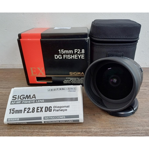 584 - A boxed Sigma 15mm 1:2.8 EX DG diagonal fisheye lens for Canon AF