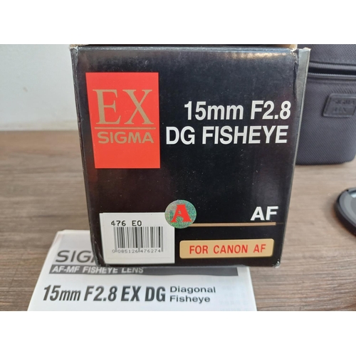 584 - A boxed Sigma 15mm 1:2.8 EX DG diagonal fisheye lens for Canon AF