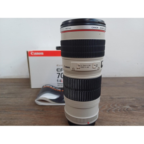 585 - A boxed Canon Ultrasonic (red) L-series EF 70-200mm 1:4 USM zoom lens for Canon AF with ET-74 lens h... 