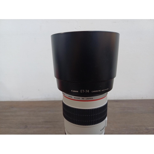 585 - A boxed Canon Ultrasonic (red) L-series EF 70-200mm 1:4 USM zoom lens for Canon AF with ET-74 lens h... 