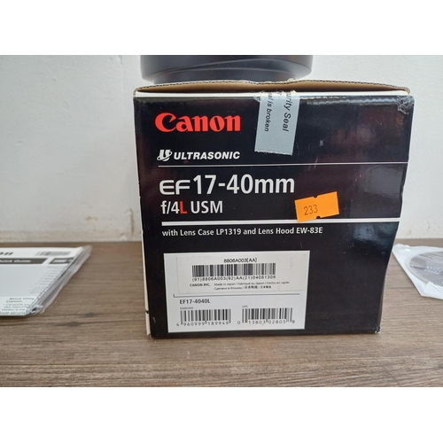 586 - A boxed Canon Ultrasonic (red) L-series 17-40mm 1:4 EF lens for Canon AF with Hoya Pro1 Digital filt... 