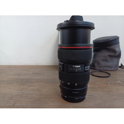 587 - A boxed Canon Ultrasonic (red) L-series EF 24-70mm 1:2.8 L II USM zoom lens fitted with EF-EOS R mou... 