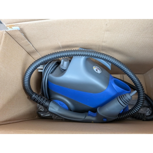 743 - A boxed Delta Multi purpose steam cleaner