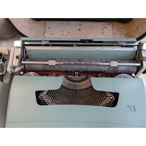 745 - Two cased portable typewriters, one Olivetti Lettera 32 and one Brother 250