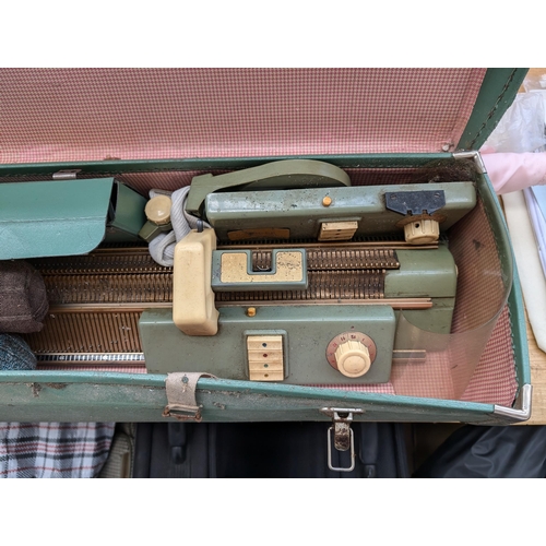 749 - Three knitting machines, one cased early 1970s Singer, one Empiral Knitmaster SRP-50 and one Empiral... 