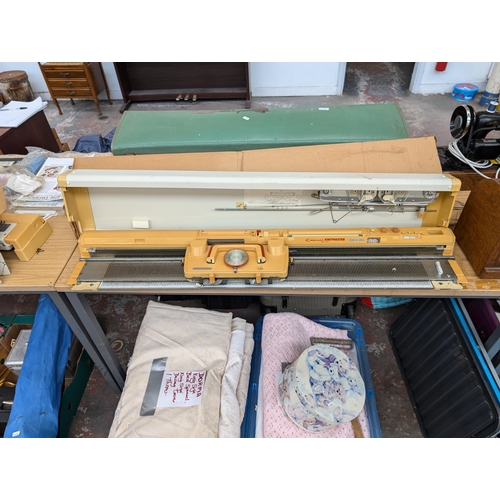 749 - Three knitting machines, one cased early 1970s Singer, one Empiral Knitmaster SRP-50 and one Empiral... 