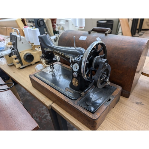 754 - A cased 1935 Singer 99K hand crank sewing machine