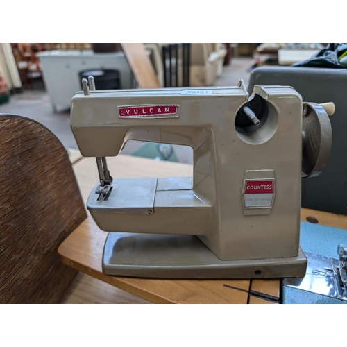 755 - Two sewing machines, one cased Singer 285K electric with foot pedal and accessories and one Vulcan C... 