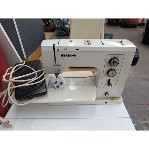 758 - Two items, one cased Bernina Record 830 electric sewing machine with foot pedal and one sewing machi... 