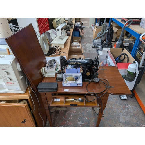 760 - A mid 20th century sewing machine table containing 1950 Singer 201K electric sewing machine with foo... 