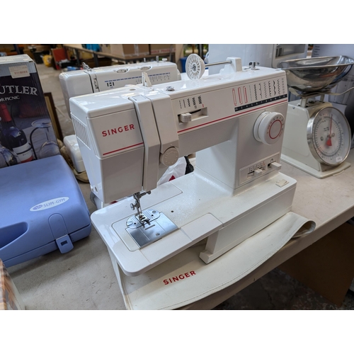 768 - A collection of items to include Singer 9081 electric sewing machine, E&R Classic LC21 electric sewi... 