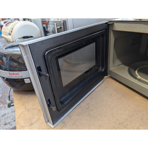 772 - Two items, one Panasonic NN-SD279S 850w inverter microwave oven and one Kenwood Chef KM300 food mixe... 