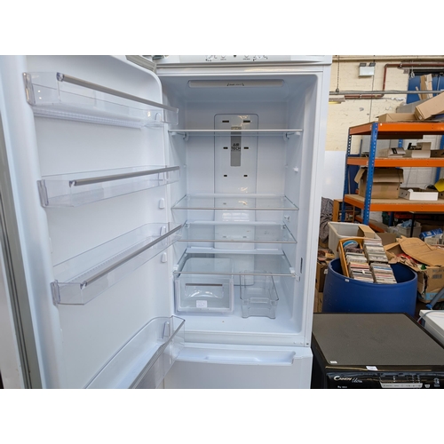 775 - A Hotpoint FCFL2010 upright fridge freezer - approx. 199cm high