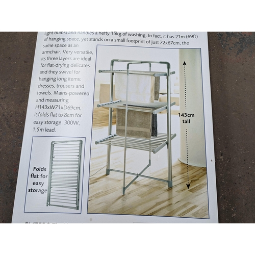 785 - A boxed Easylife three tier heated tower clothes airer