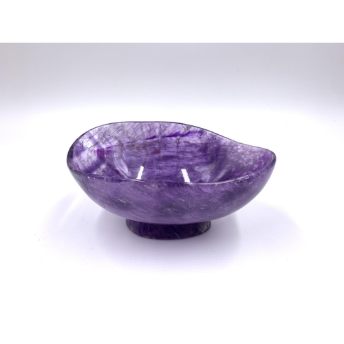 2151 - A carved amethyst pedestal bowl, signed to base - approx. 7cm high x 10cm wide x 15cm long