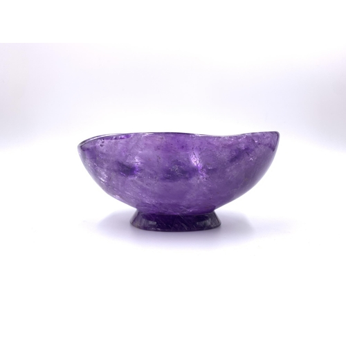 2151 - A carved amethyst pedestal bowl, signed to base - approx. 7cm high x 10cm wide x 15cm long