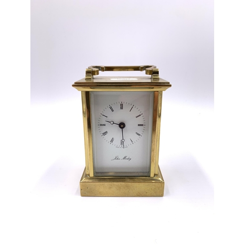 2154A - A John Morley brass cased carriage clock - approx. 11cm high x 8cm wide x 6cm deep