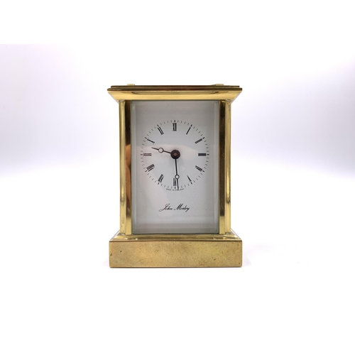 2154A - A John Morley brass cased carriage clock - approx. 11cm high x 8cm wide x 6cm deep