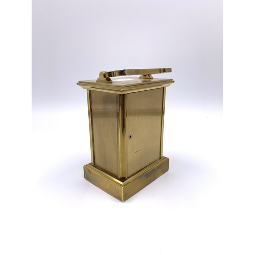 2154A - A John Morley brass cased carriage clock - approx. 11cm high x 8cm wide x 6cm deep