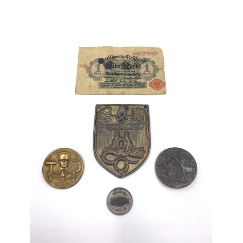 2163 - Five WWI and later German items, Wertmarke Zeppelin token, 1914 1 Mark banknote, Warsaw shield medal... 