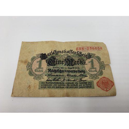 2163 - Five WWI and later German items, Wertmarke Zeppelin token, 1914 1 Mark banknote, Warsaw shield medal... 