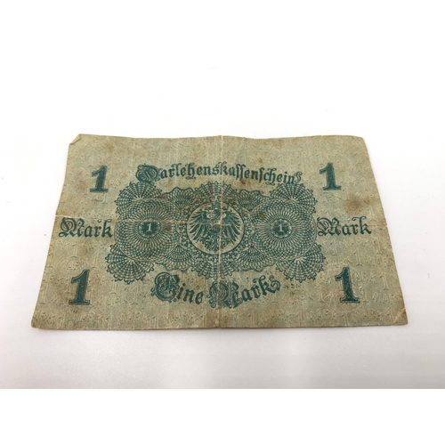 2163 - Five WWI and later German items, Wertmarke Zeppelin token, 1914 1 Mark banknote, Warsaw shield medal... 