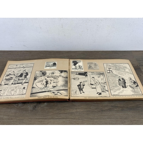 2166 - A WWII scrapbook containing a large collection of British comical newspaper clippings