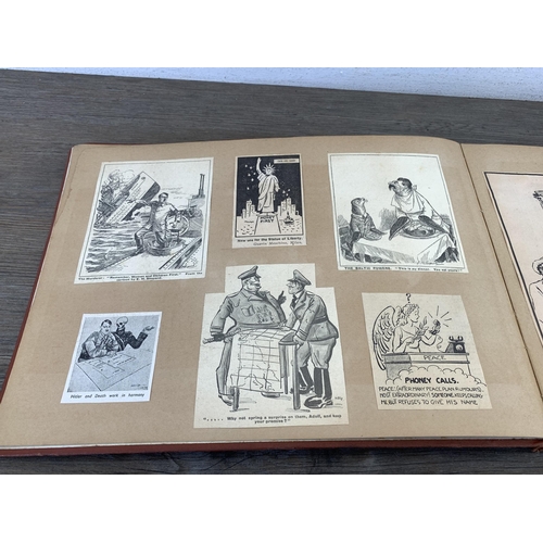 2166 - A WWII scrapbook containing a large collection of British comical newspaper clippings