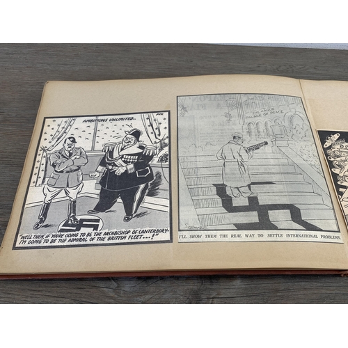 2166 - A WWII scrapbook containing a large collection of British comical newspaper clippings