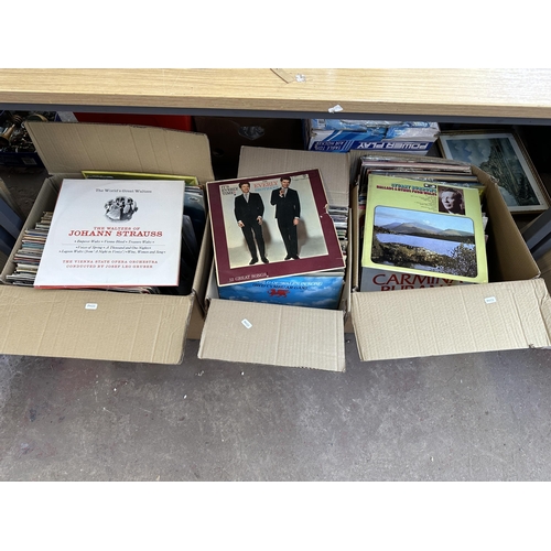 1102 - Eight boxes containing a large collection of LP vinyl records to include Johnny Cash, The Everly Bro... 