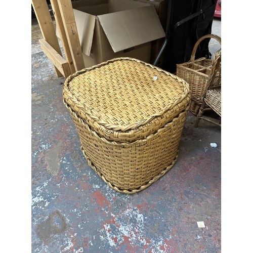 1108 - Fifteen wicker items to include linen basket, child's chair, storage chests etc.