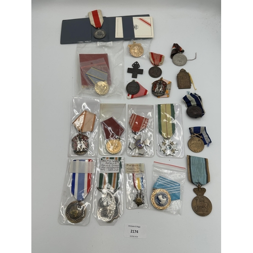 2174 - Twenty military medals to include WWII Japanese Imperial Red Cross, WWII Greek War 1940-1941, United... 