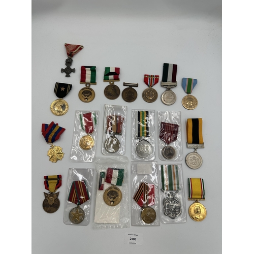 2186 - Twenty military medals to include United Nations, Kuwait Liberation, Austrian Iron Cross of Merit, U... 