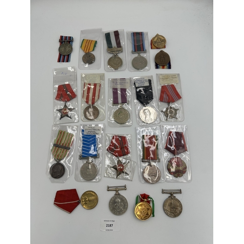 2187 - Twenty military medals to include India Ucchh Tungta, Africa Service, WWI Japanese Victory, Italian ... 