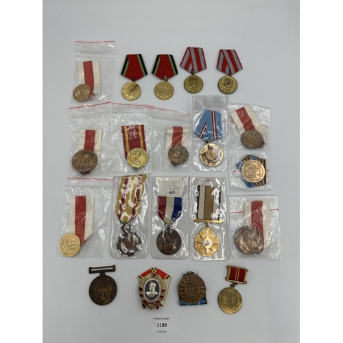 2189 - Twenty military medals to include American Oklahoma National Guard Service, Belgian Korean War Servi... 