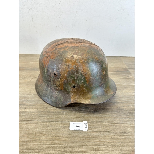 2202 - A WWII German M40 steel helmet