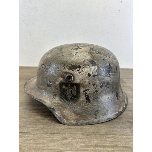 2204 - A reproduction WWII German M35 double decal helmet