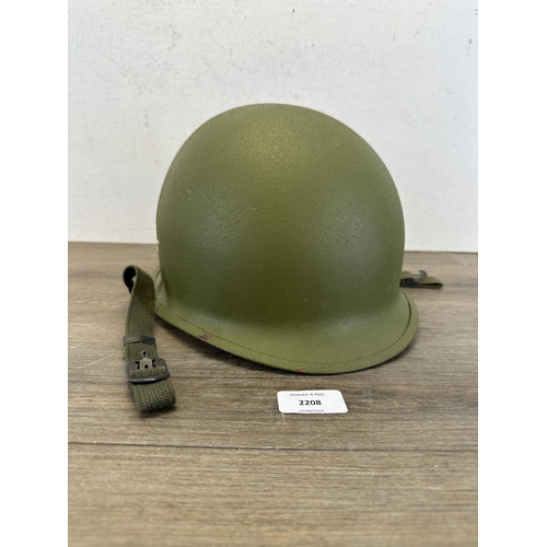 2208 - A Vietnam era US M1 helmet