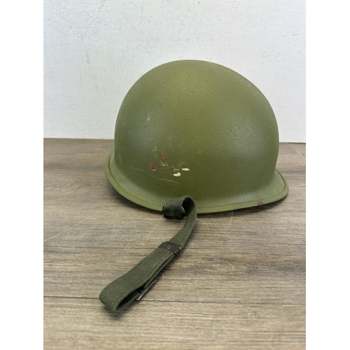 2208 - A Vietnam era US M1 helmet