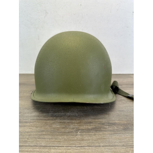 2208 - A Vietnam era US M1 helmet