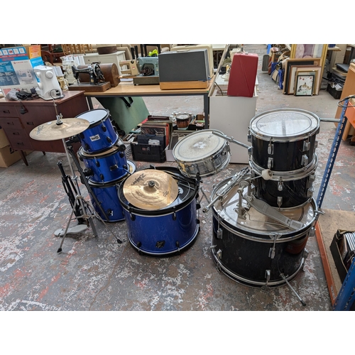 653 - A collection of drum kits items to include Mapex bass drum pedal, snare with remo head, Zildjian ZBT... 