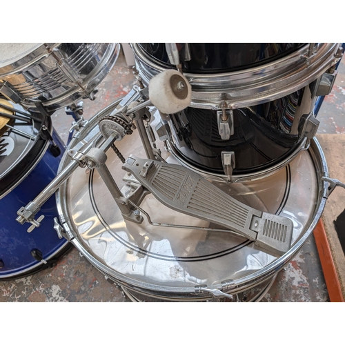 653 - A collection of drum kits items to include Mapex bass drum pedal, snare with remo head, Zildjian ZBT... 