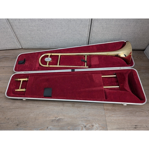 661 - A cased Besson 600 trombone with Besson 7 mouthpiece