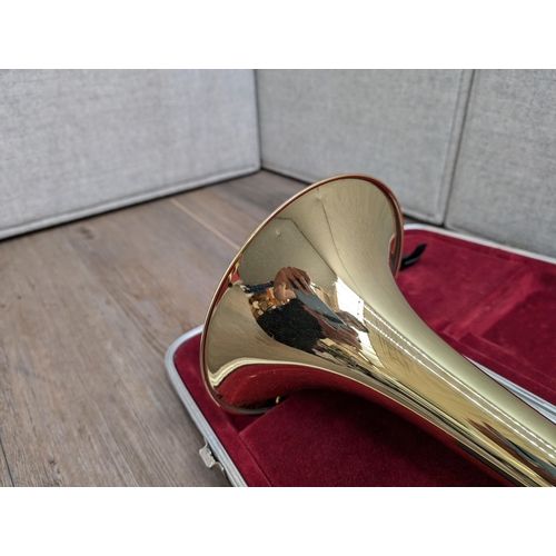 661 - A cased Besson 600 trombone with Besson 7 mouthpiece