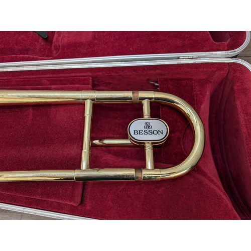 661 - A cased Besson 600 trombone with Besson 7 mouthpiece